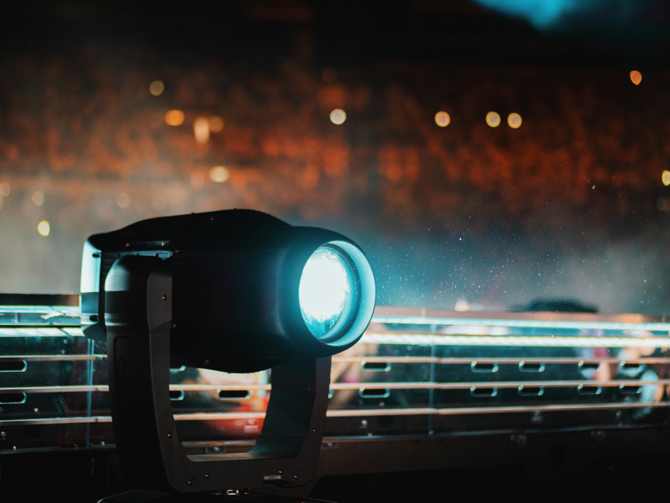 A stage light in a dark theater